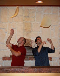 Brothers Spinning Pizza